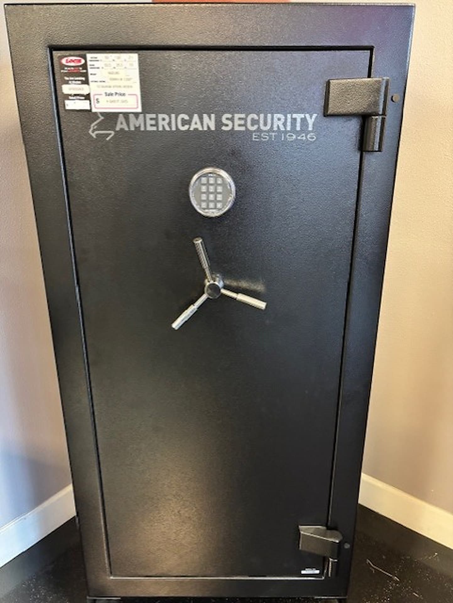 Black American Security safe with an electronic keypad on display