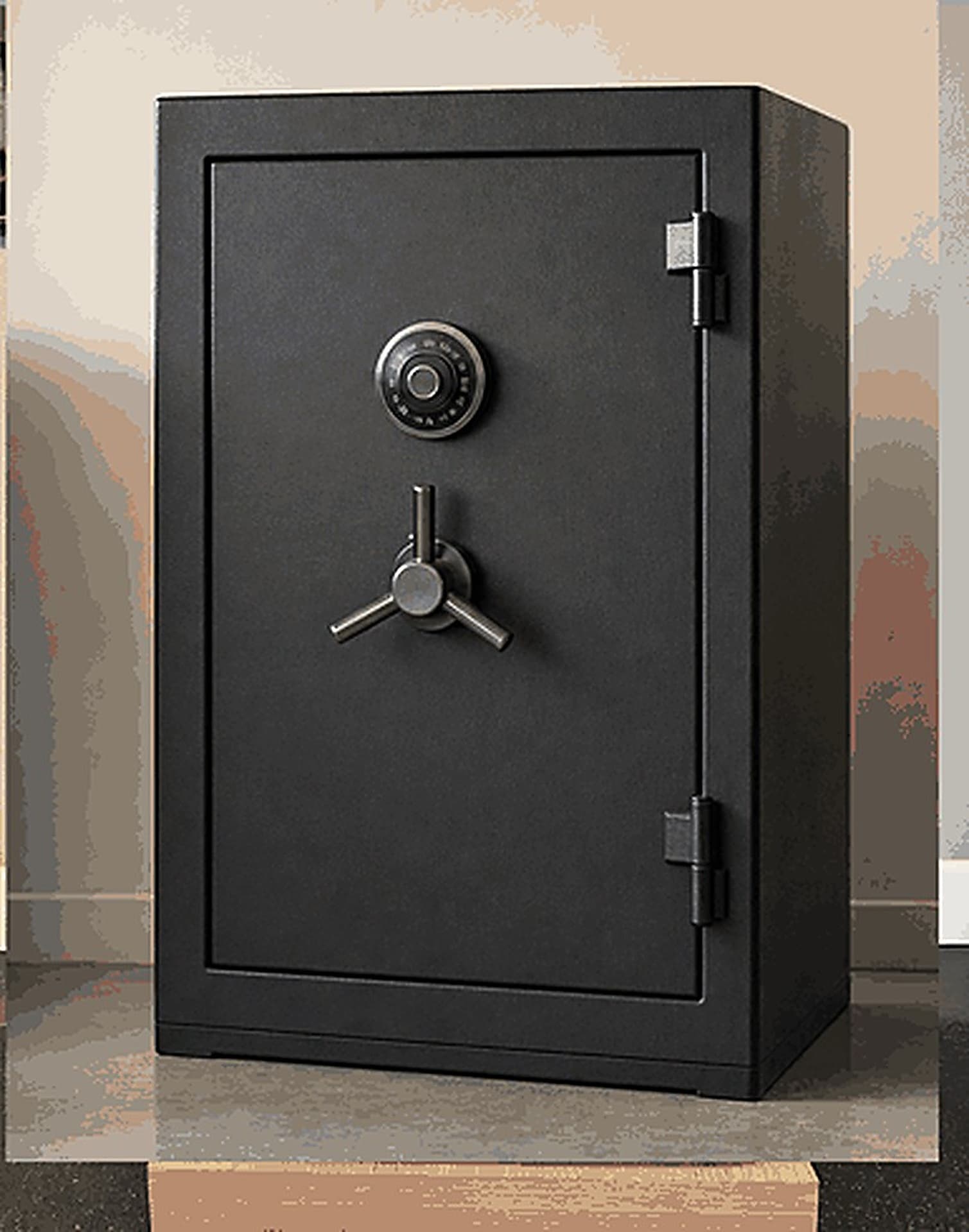 Black combination safe with a spoke handle on a wooden base